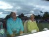 Edith is pictured here with daughter Carole watching play from within the clubhouse at Stoney Stratford in the Bucks Cup final versus Bletchley Town on 4th September 2011. An image of the action on the green is reflected by the window pane.
